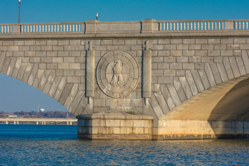 Arlington Memorial Bridge view of arch from water on Potomac River